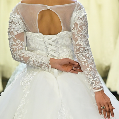 White lace church wedding ball gown with embroidered floral details and graceful silhouette