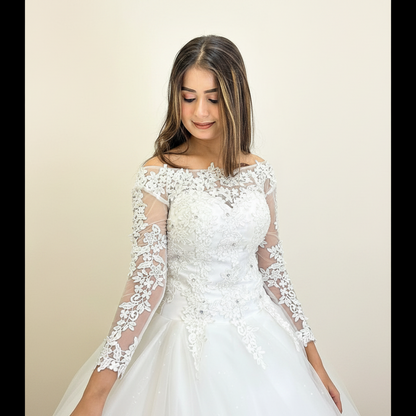 Classic Christian wedding ball gown with illusion neckline and intricate lace appliqués