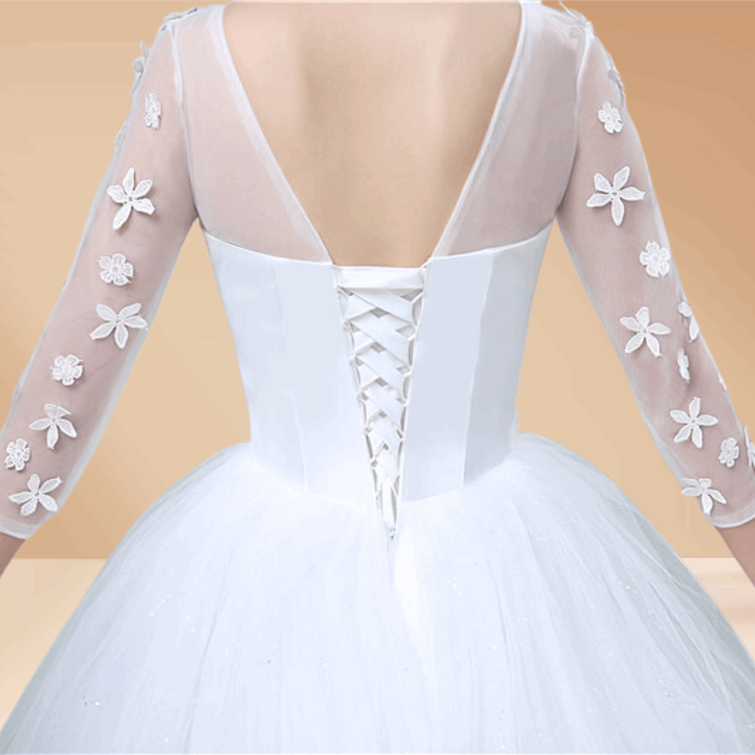 Detail of neckline and bodice on White Ball Gown — GownLink GLGZ521