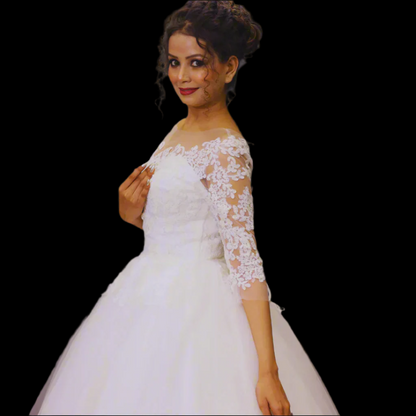 Classic Christian wedding ball gown with lace bodice, tulle skirt, and timeless bridal elegance
