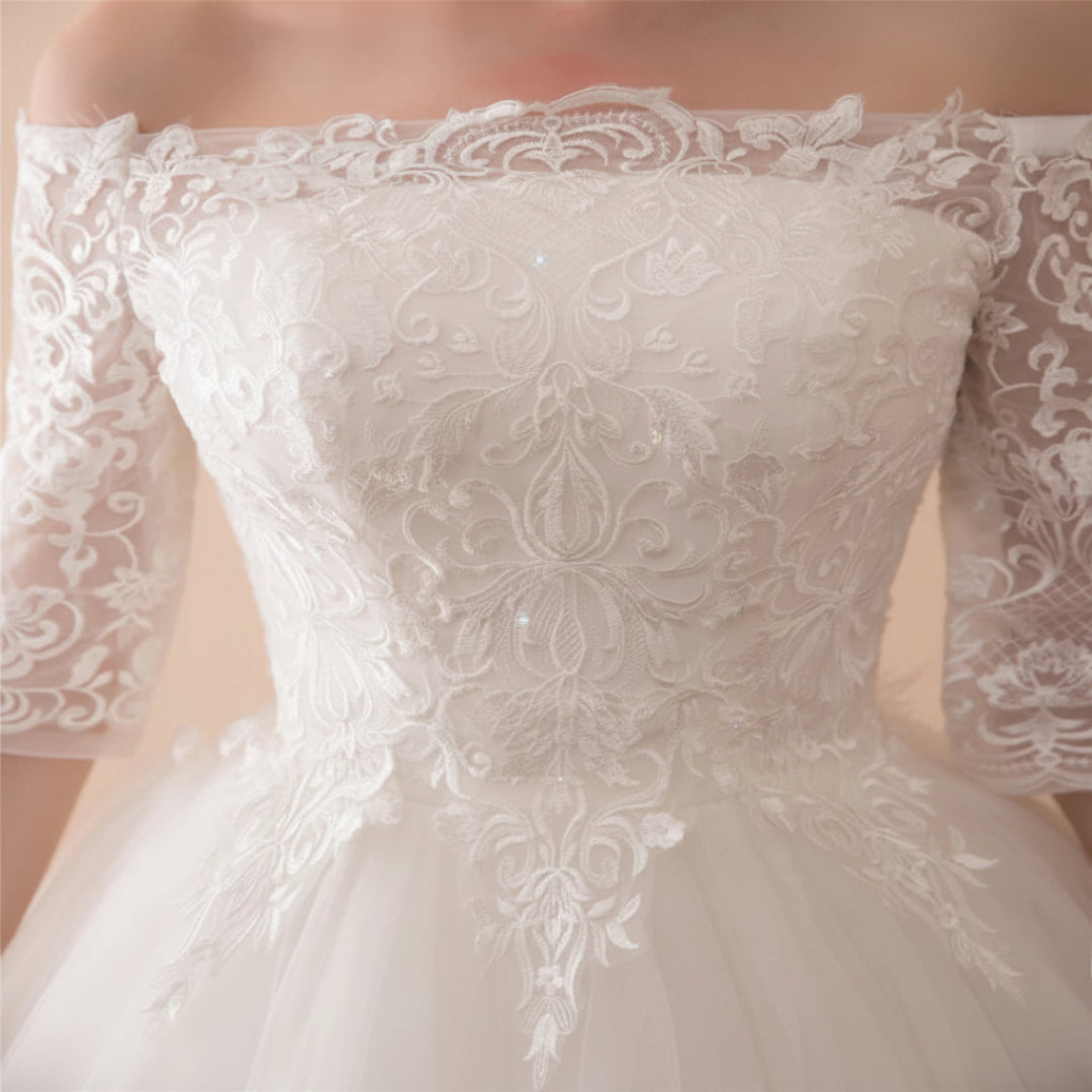 Classic white Christian wedding gown with lace bodice and romantic princess-style design