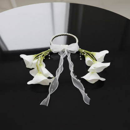 Close-up of flower arrangement in Clutch Bridal Bouquet — GownLink B-137