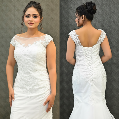 Christian bridal dress with crystal-embellished floral lace and a fitted mermaid silhouette