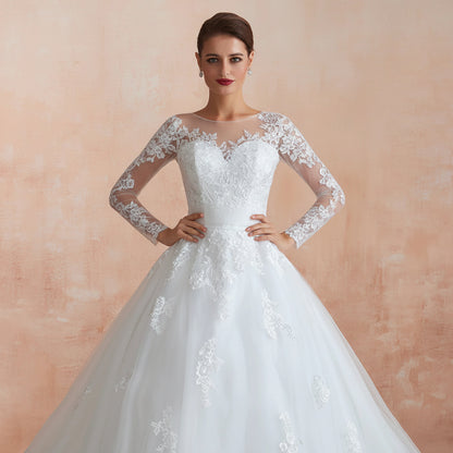 Designer Christian bridal ball gown with timeless elegance and intricate lace craftsmanship