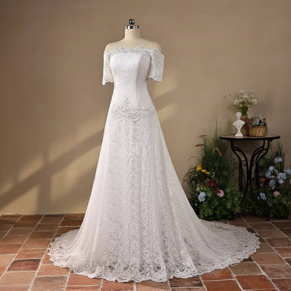 Back closure and button detail on White Mermaid with Sleeve Detail — GownLink GL8646T