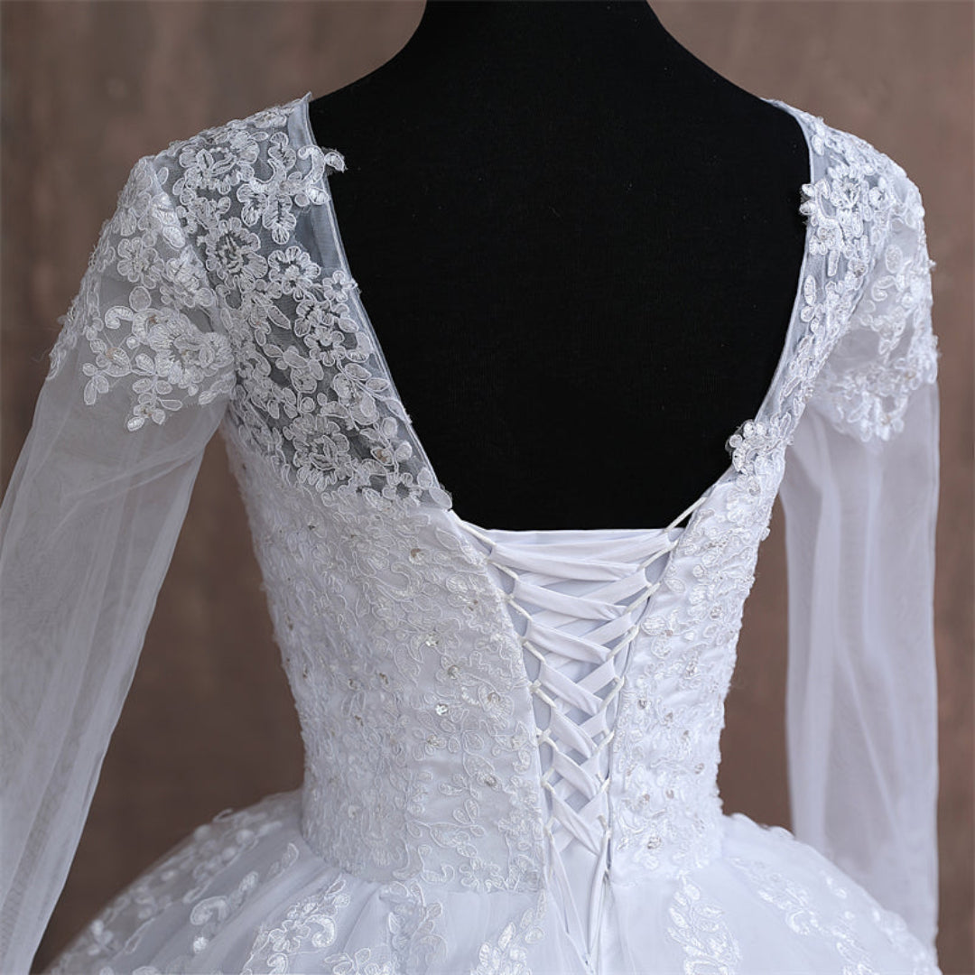 Full-length view of White Ball Gown with train spread on floor — GownLink GLGB141