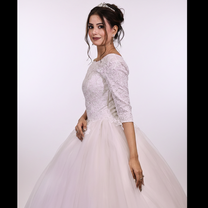 Elegant princess-style Christian bridal dress with lace detailing and timeless white finish