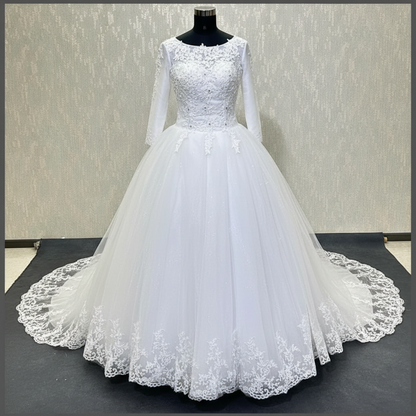 Elegant white Christian bridal dress with fitted lace bodice and flowing princess skirt