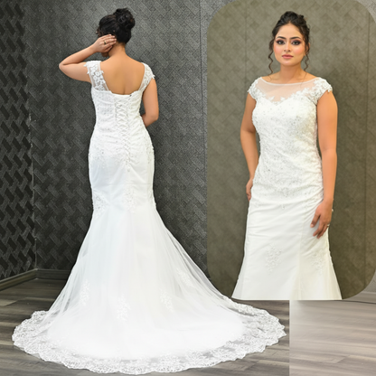Fitted Christian wedding gown featuring embroidered lace, illusion neckline, and elegant bridal finish