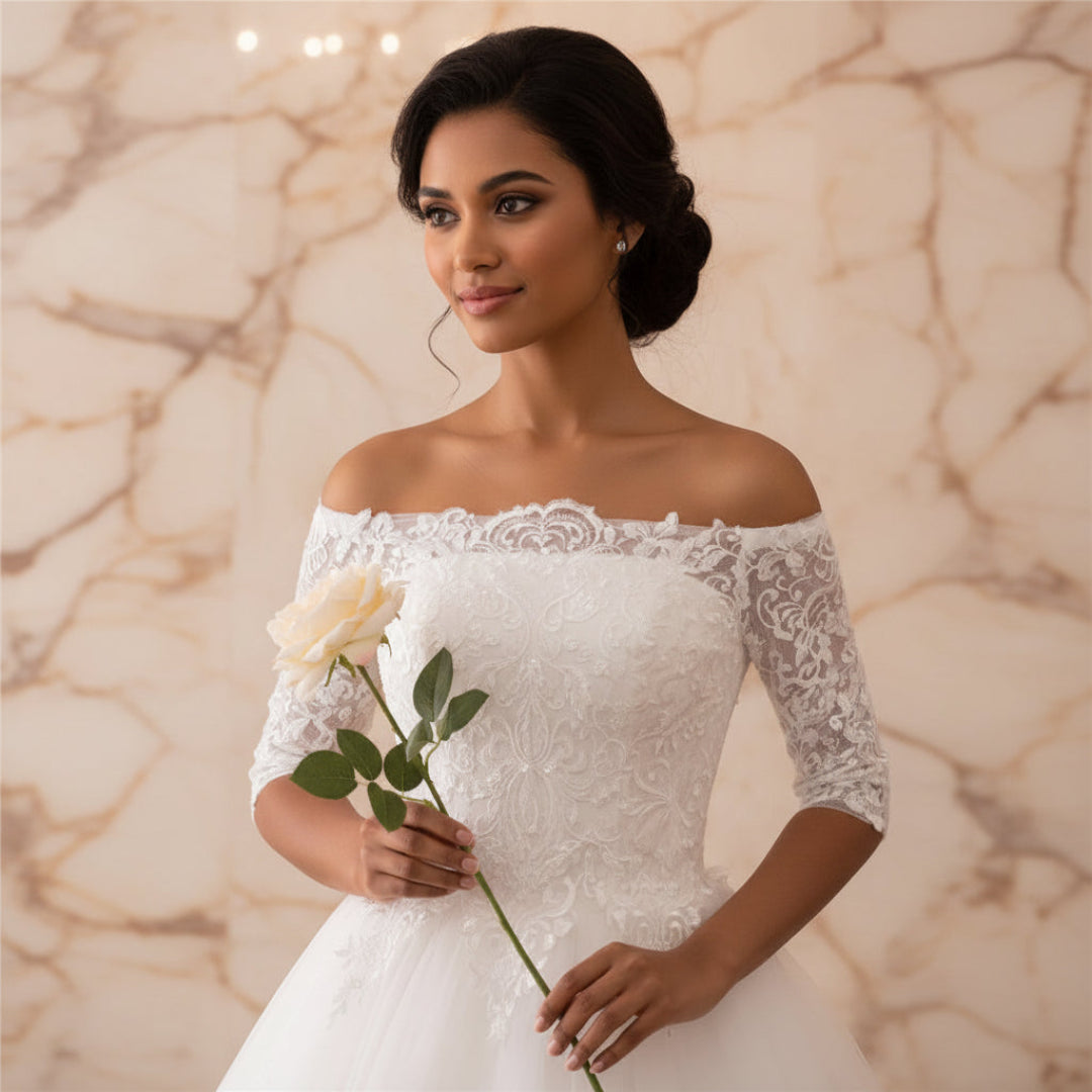 Christian bridal dress with floral lace appliqués, off-shoulder neckline, and flowing tulle skirt