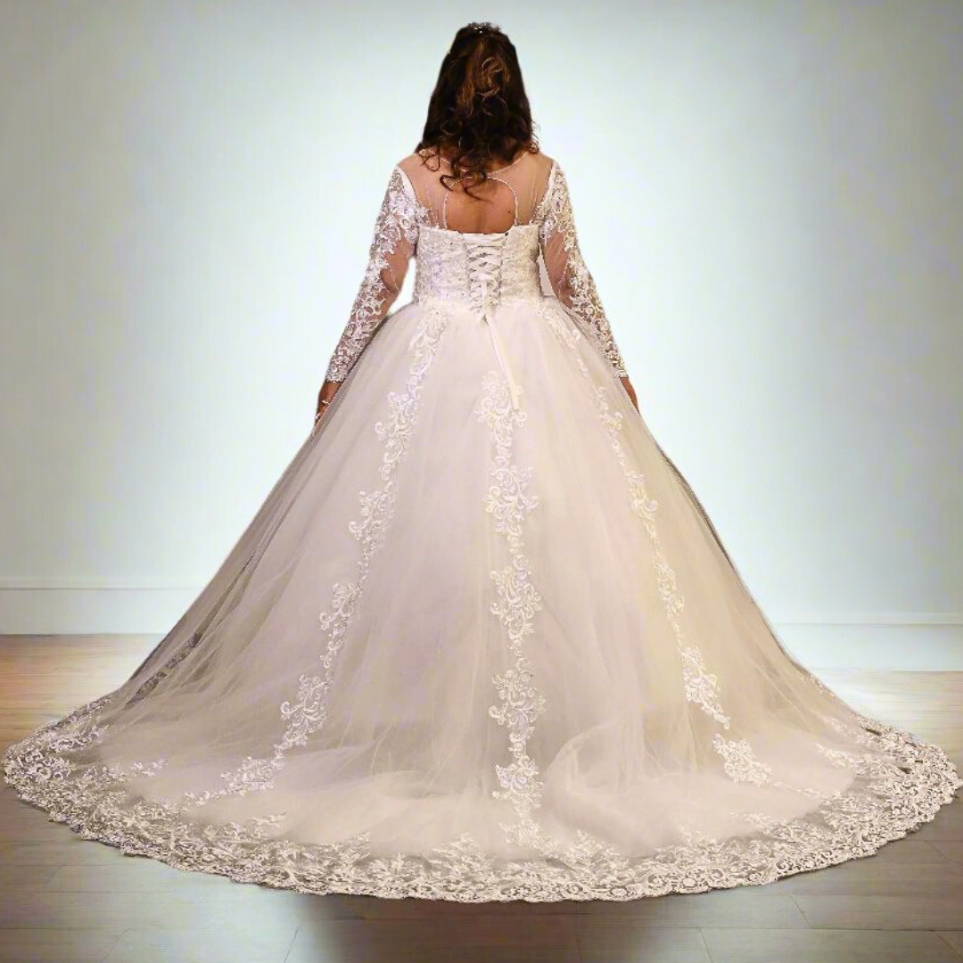 Christian bridal dress featuring floral lace embroidery, illusion neckline, and long sleeves