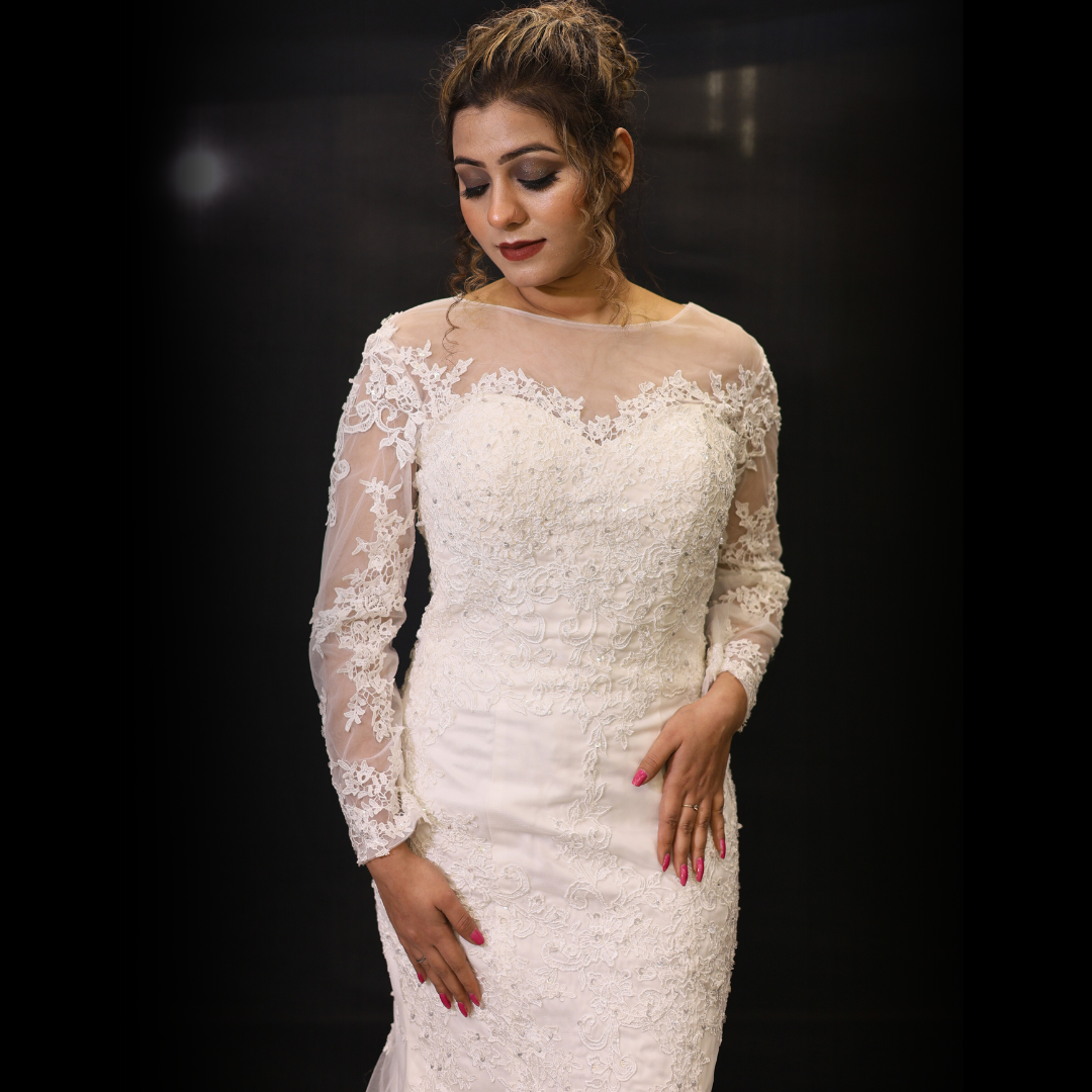 Christian bridal dress with floral lace embroidery, illusion neckline, and elegant mermaid silhouette