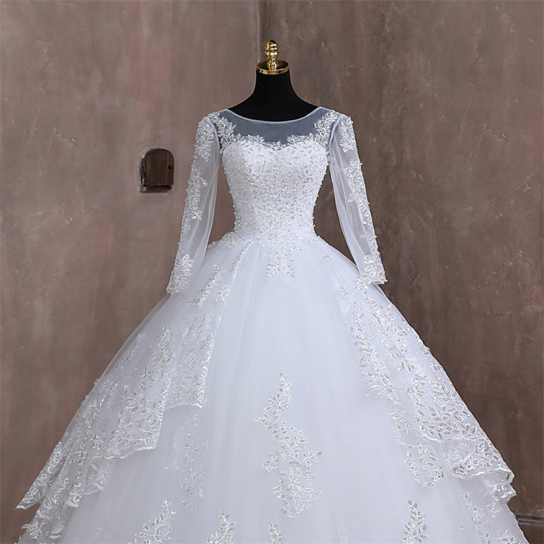 Grand Christian wedding ball gown with shimmering lace details and timeless princess-inspired elegance
