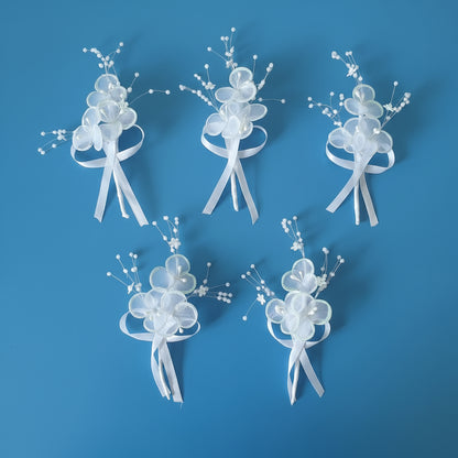 Close-up of flower and leaf detail on Groom Boutonniere Set — GownLink CF46
