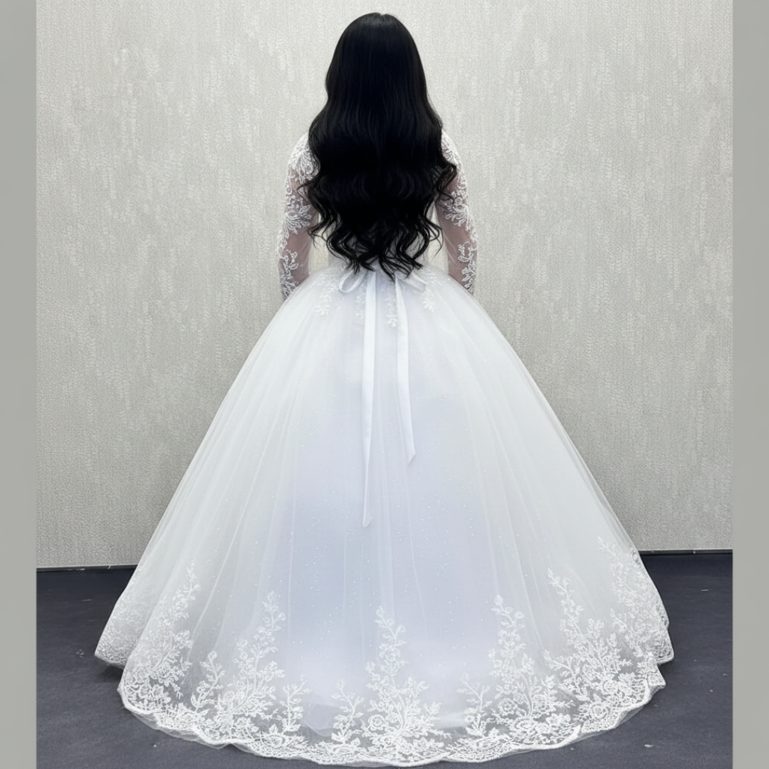Christian bridal dress with illusion neckline, lace sleeves, and luxurious tulle skirt