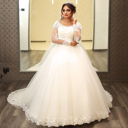 Front view of Bridal Gown with Train on model against studio backdrop — GownLink GLYCX01T