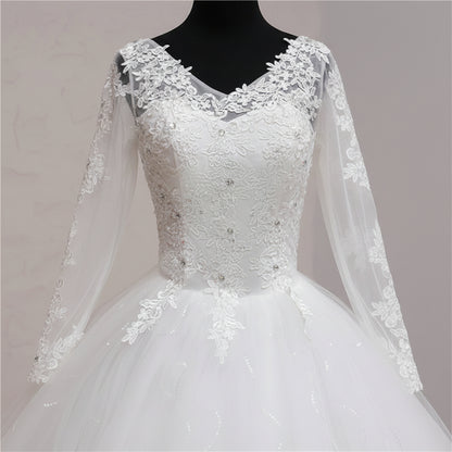 Luxury Christian ball gown with sparkling lace bodice, soft tulle skirt, and graceful train