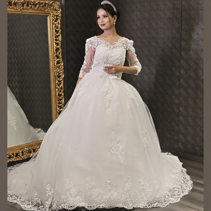 Luxury Christian wedding gown with embroidered lace detailing, full tulle skirt, and timeless bridal elegance