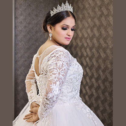 Luxury Christian princess wedding dress with lace appliqués and voluminous tulle silhouette