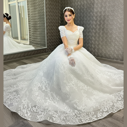 Side profile view of White Bridal Gown Sparkle with Train showing silhouette — GownLink GLGT166T
