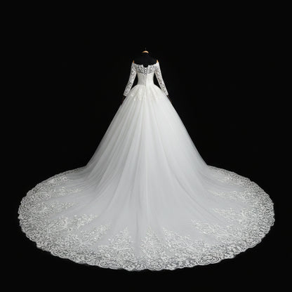 Back view of White Bridal Gown with Off Shoulder showing train and closure detail — GownLink GLQD09T