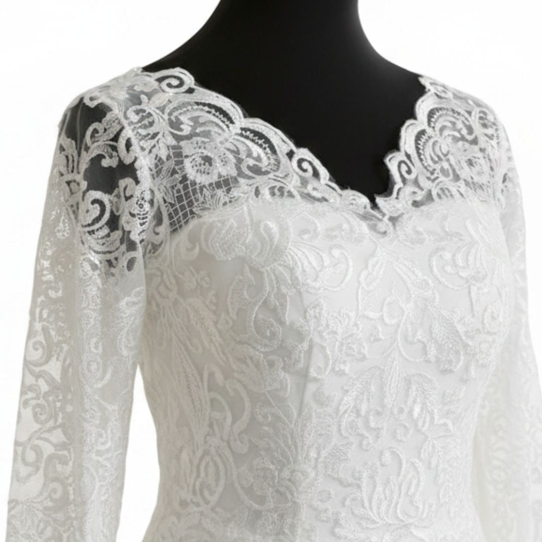 Luxury white princess bridal dress by GownLink with embroidered lace, long sleeves, and a classic Christian wedding design