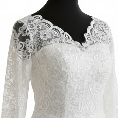 Luxury white princess bridal dress by GownLink with embroidered lace, long sleeves, and a classic Christian wedding design