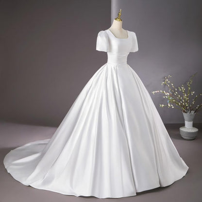 Side profile view of White Bridal Gown Satin with Train showing silhouette — GownLink GLHMST8