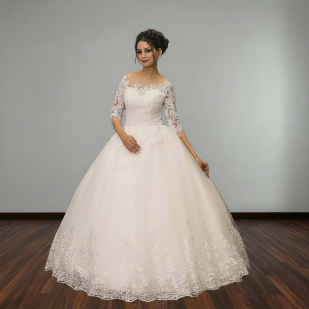 Elegant off-shoulder Christian wedding ball gown with lace bodice and voluminous tulle skirt by GownLink