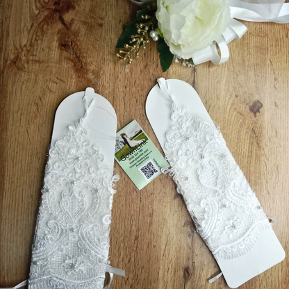 Front view of Pearl Bridal Gloves on hands — GownLink G29