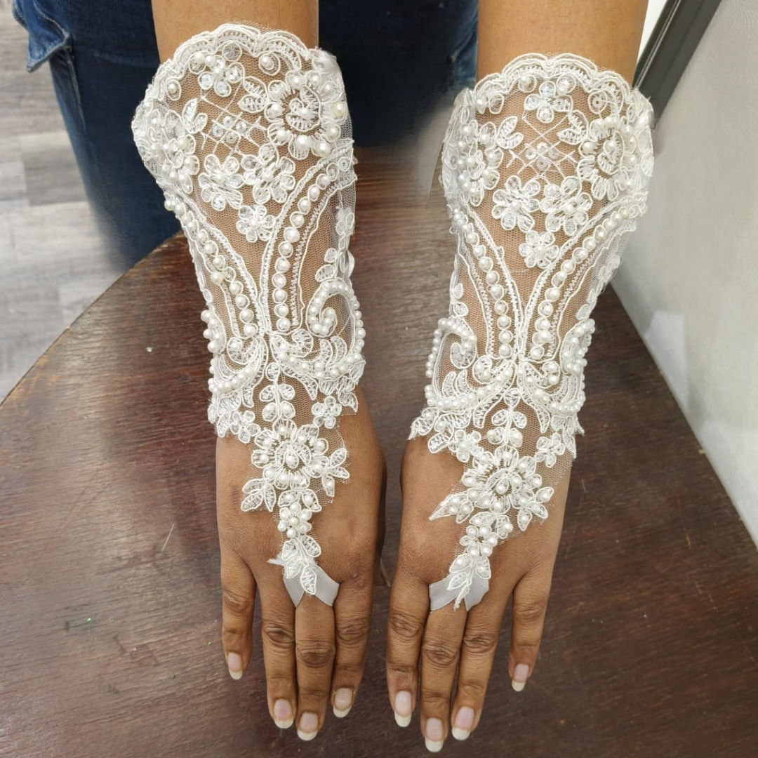 Detail of lace or mesh fabric on Pearl Bridal Gloves — GownLink G2