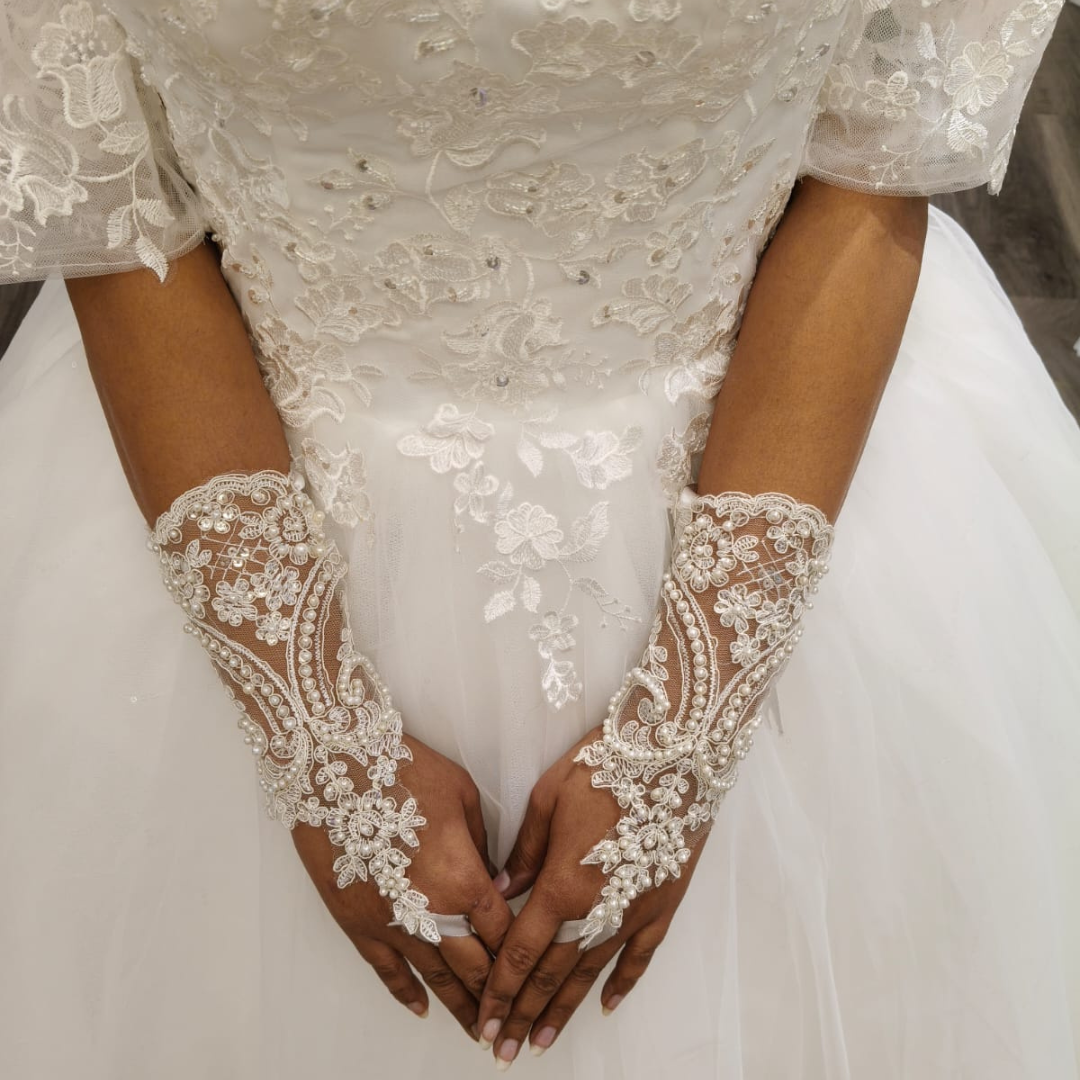 Side view of Pearl Bridal Gloves showing fit and length — GownLink G2