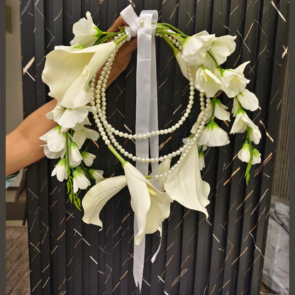Close-up of flower arrangement in Pink Bridal Bouquet — GownLink B-59