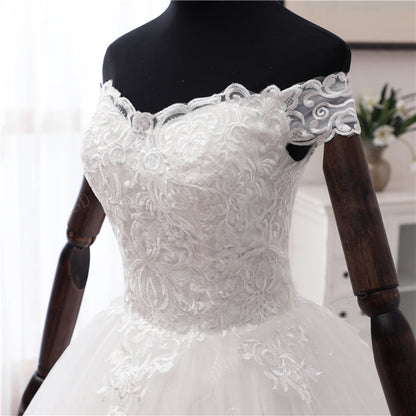 Premium Christian wedding dress with floral lace appliqués and graceful ball gown design
