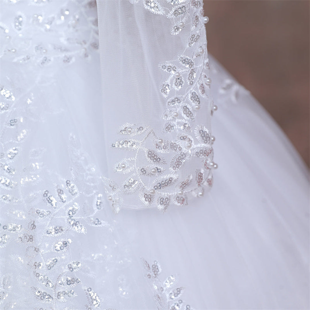 Premium white Christian wedding dress with intricate lace detailing and luxurious princess fit