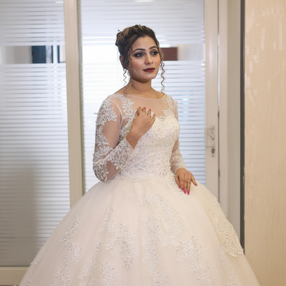 Princess-style bridal gown by GownLink with floral lace embroidery and a graceful cathedral-inspired design
