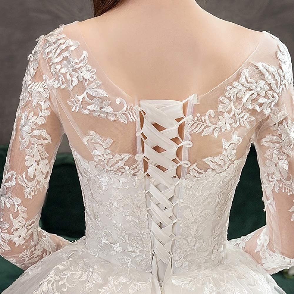 Princess-style Christian wedding gown featuring a fitted lace bodice and flowing tulle skirt