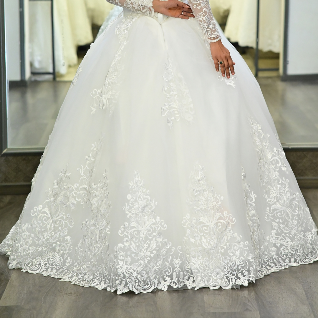 Princess-style Christian wedding gown featuring a fitted lace bodice and voluminous skirt