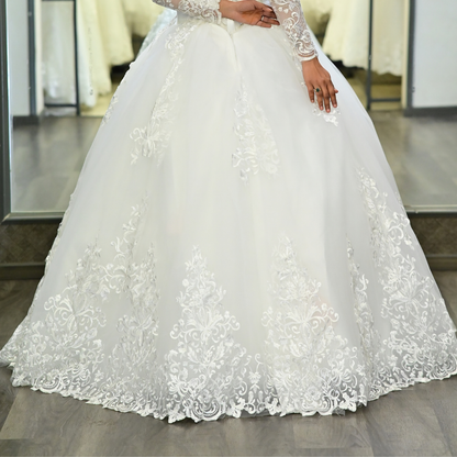 Princess-style Christian wedding gown featuring a fitted lace bodice and voluminous skirt
