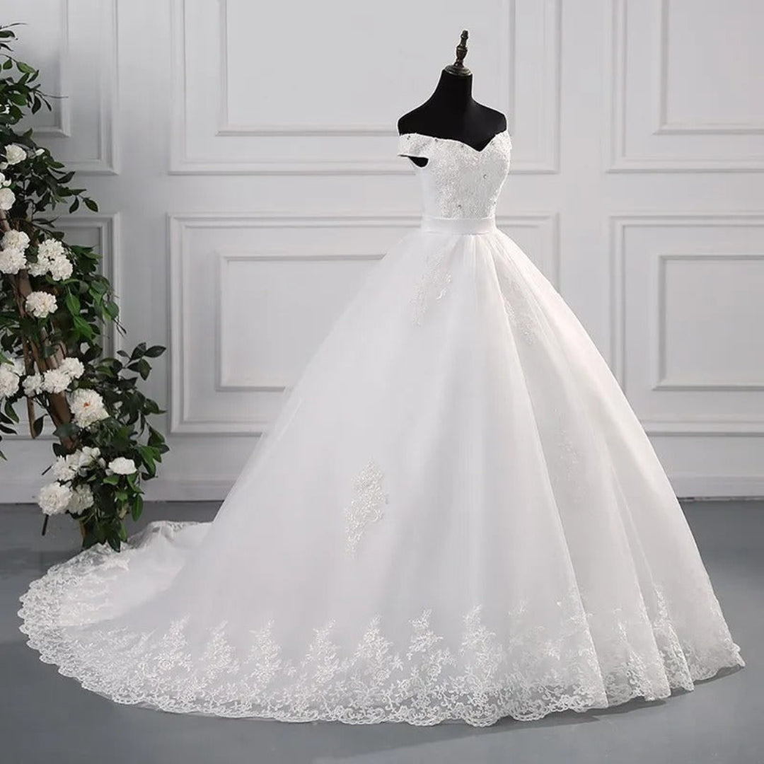 Princess-style Christian wedding dress with off-shoulder sleeves and cathedral train