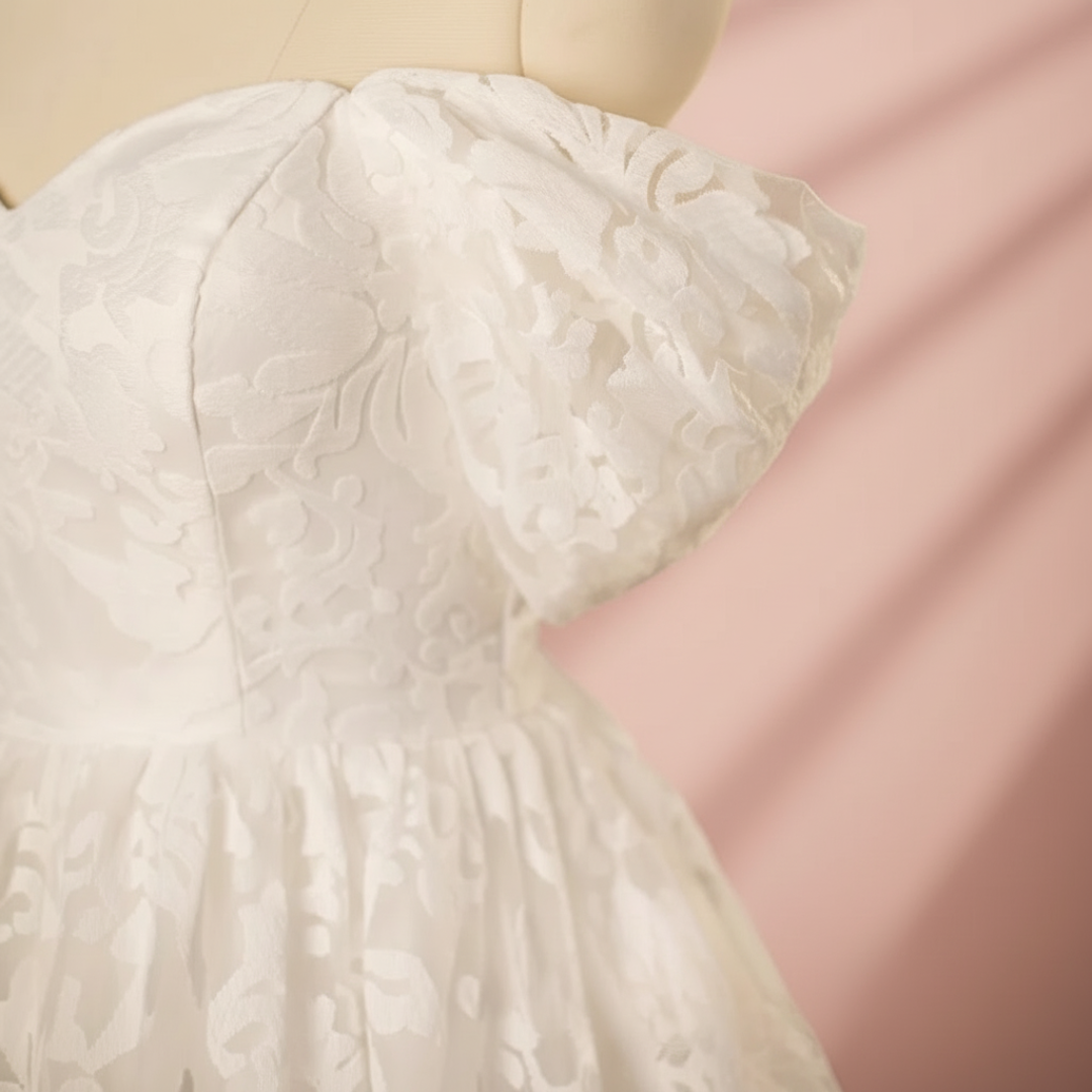 Full-length view of White A-Line Sparkle with train spread on floor — GownLink GLGT167