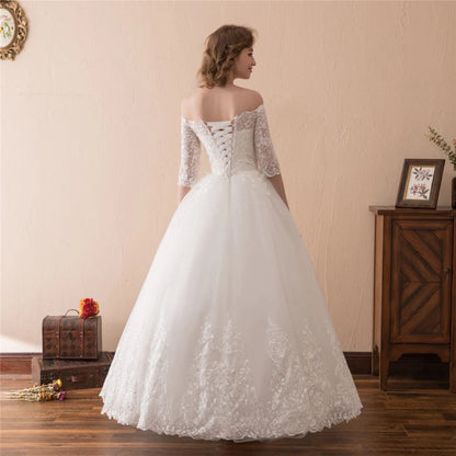 Romantic off-shoulder Christian wedding dress with elegant lace sleeves and timeless bridal style