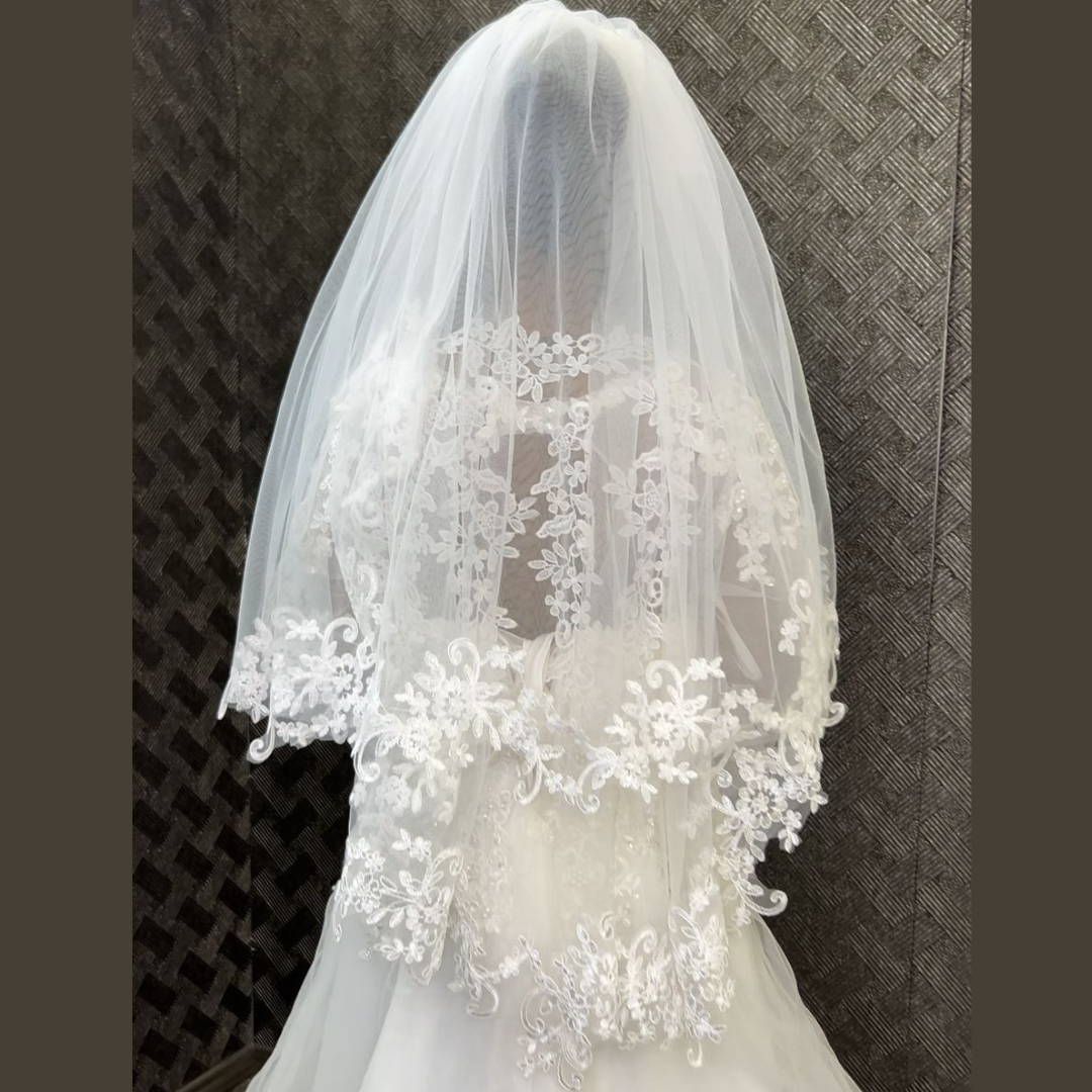 Front view of Short Bridal Veil draped over model — GownLink GLHLCV7