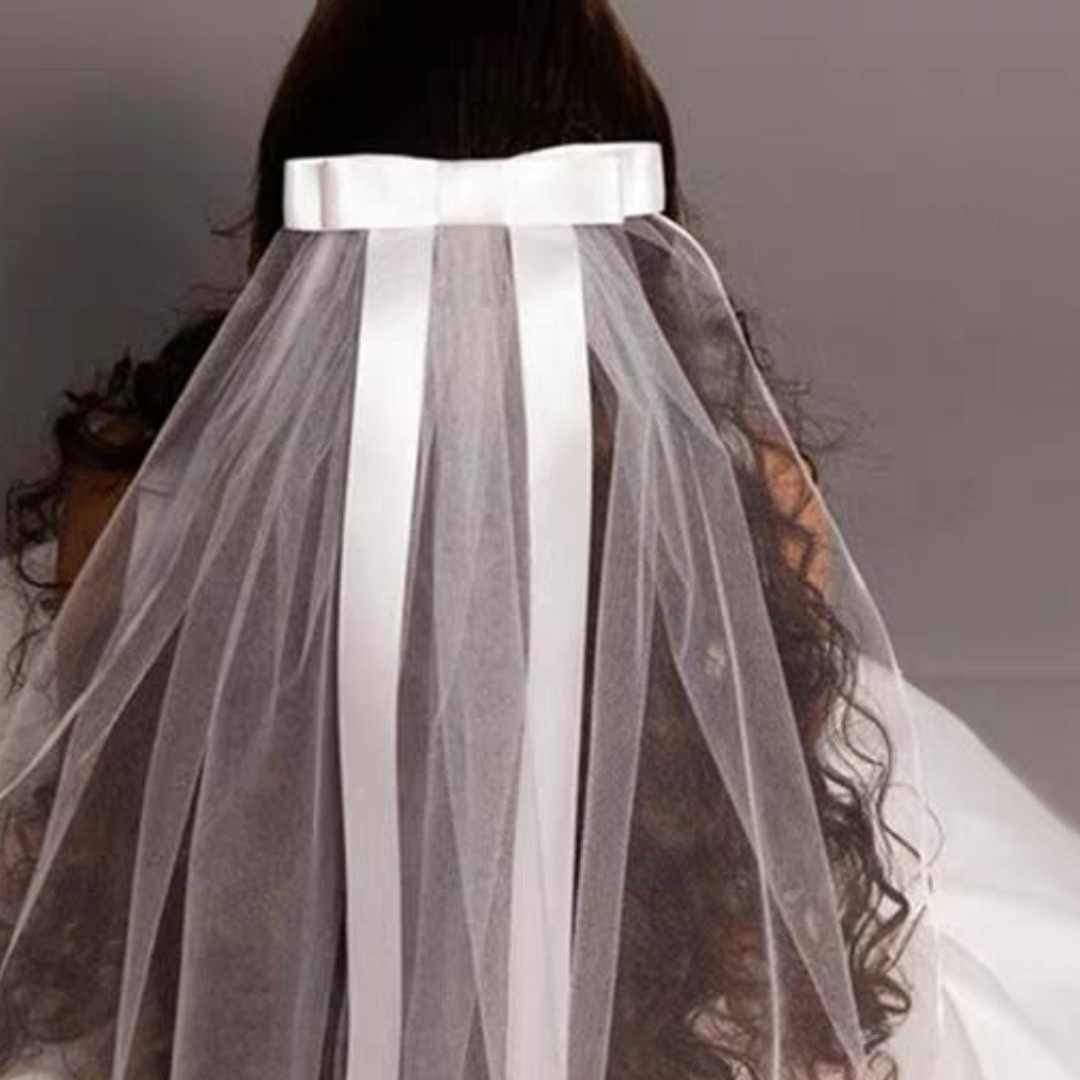 Front view of Short Bridal Veil draped over model — GownLink GLVHM13