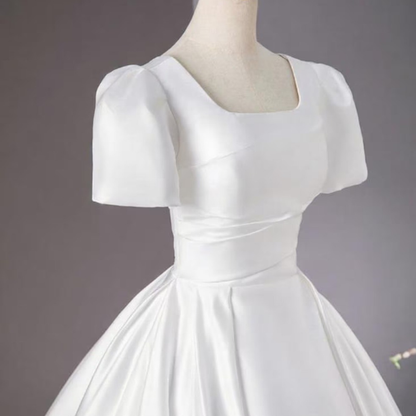Detail of neckline and bodice on White Bridal Gown Satin with Train — GownLink GLHMST8