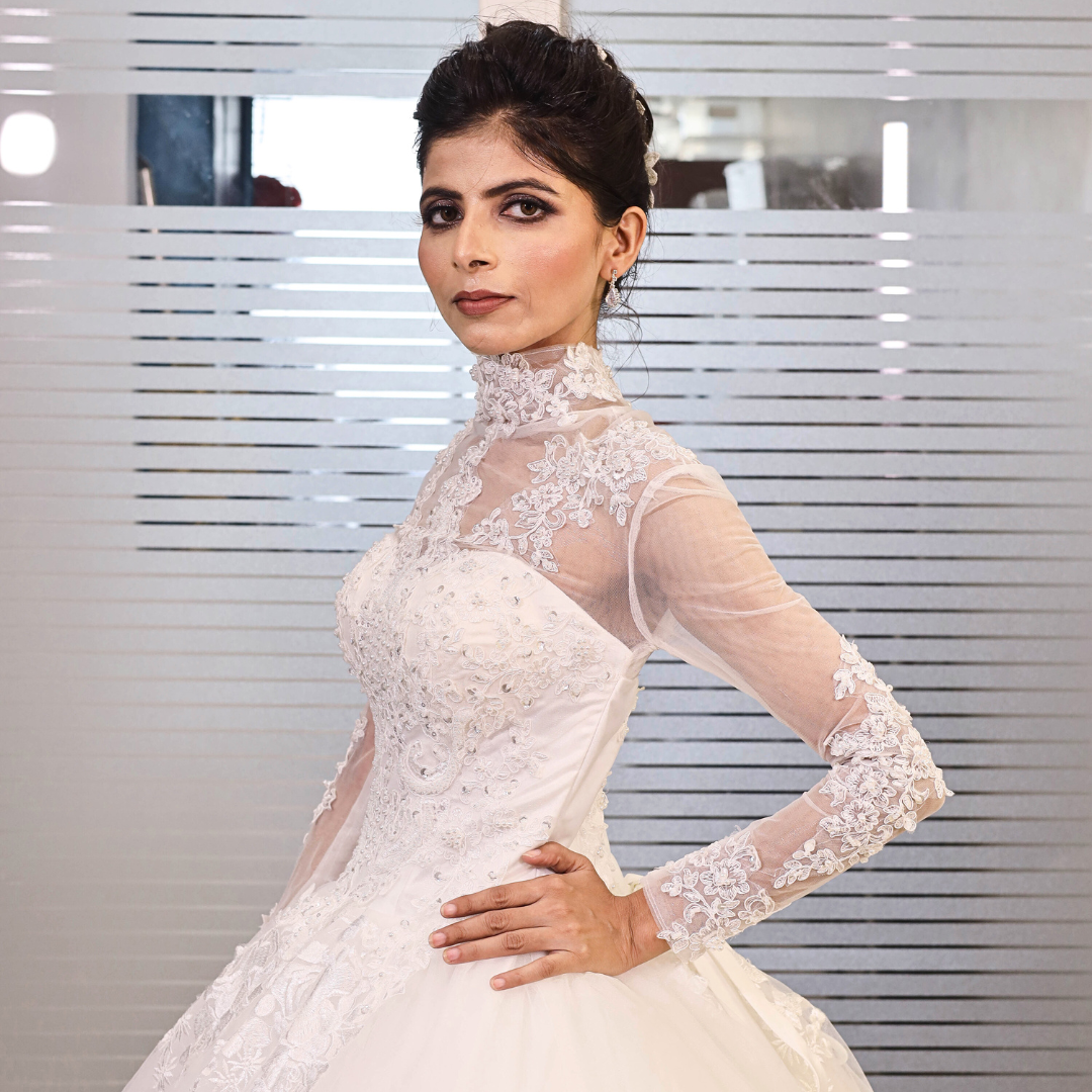 Close-up of lace and fabric detail on White Princess — GownLink GLHL2311