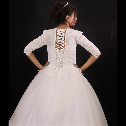 White Christian wedding ball gown with lace-trimmed hem and elegant embroidered bodice