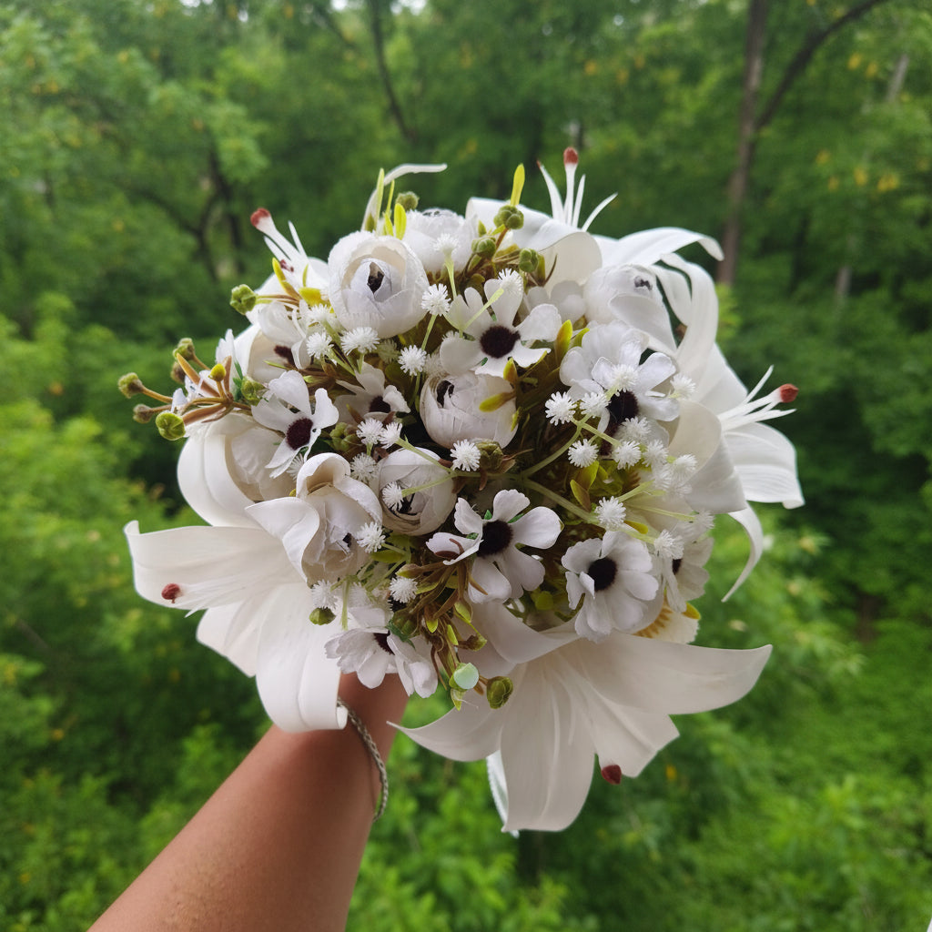 Front view of White Clutch Bridal Bouquet held by bride — GownLink B-138