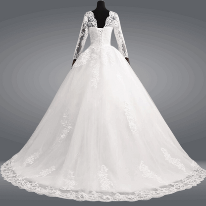 White lace bridal ball gown featuring floral embroidery and a full tulle skirt for Christian weddings