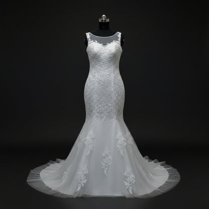 White lace Christian bridal mermaid dress with fitted silhouette and tulle train